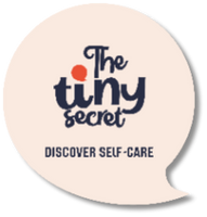 Round beige coaster with 'The tiny secret' logo and text on a white background